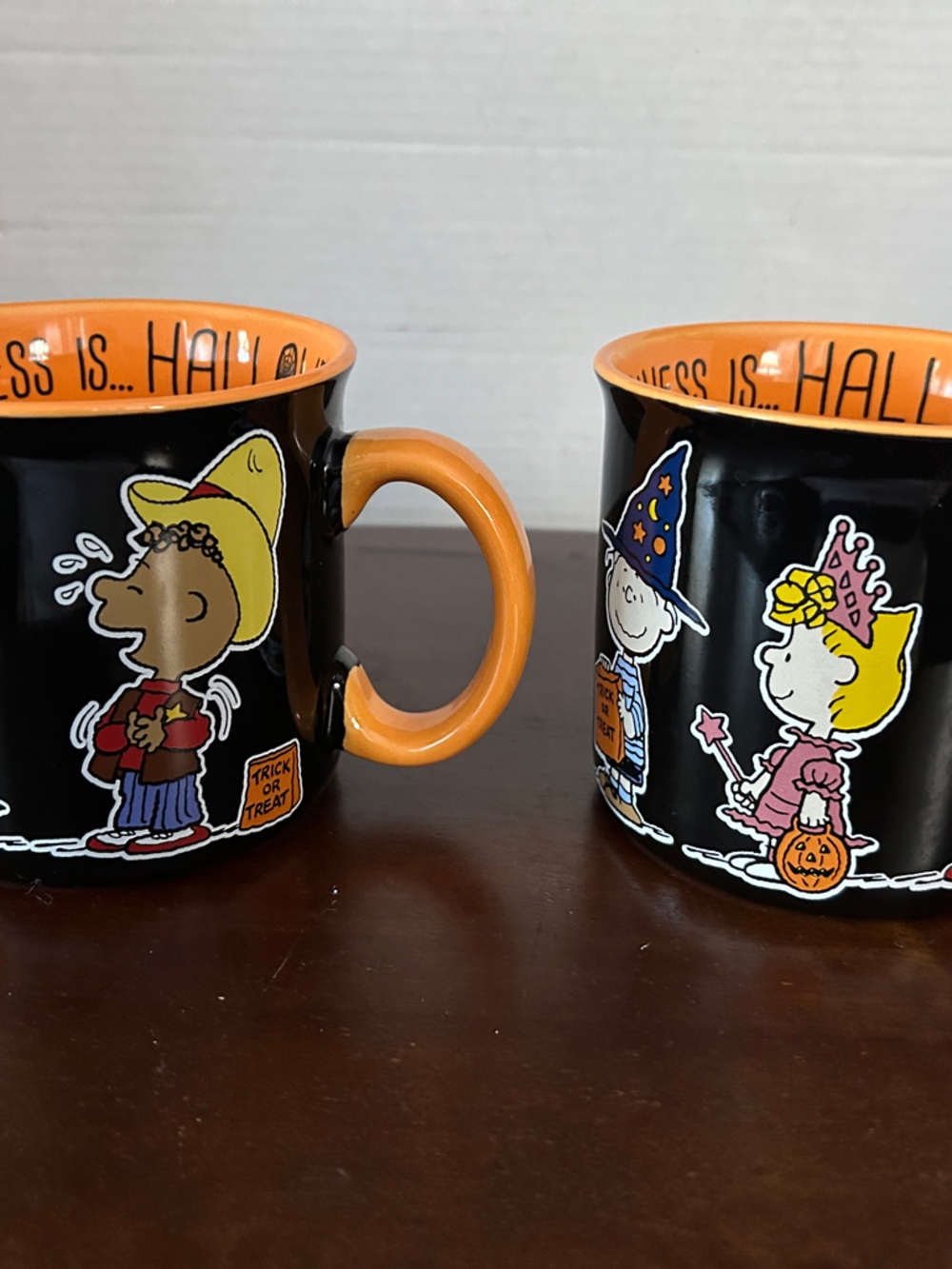 Halloween Black and Orange Peanuts set of 2 mugs “Happiness is Halloween”